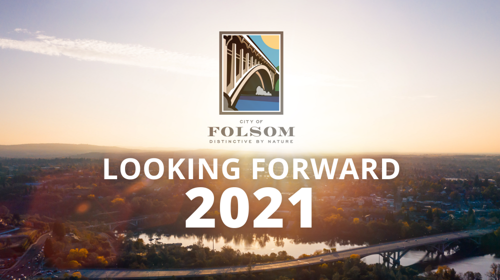 Youtube Cover for video--Looking Forward 2021 in white text with a colored stack city of folsom logo above the text. Background image is overlooking rainbow bridge and historic district with an early sunrise in the center of the image
