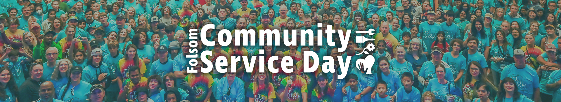 Community Service Day volunteer group photo with logo overlay